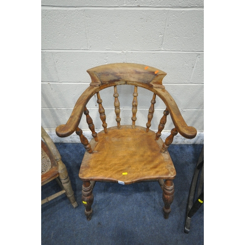 1309 - A LATE 19TH / EARLY 20TH CENTURY BOW TOP CAPTAINS CHAIR, with spindled back, dished seat, raised on ... 