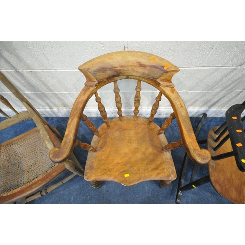 1309 - A LATE 19TH / EARLY 20TH CENTURY BOW TOP CAPTAINS CHAIR, with spindled back, dished seat, raised on ... 