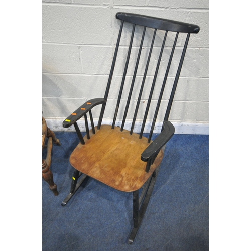 1309 - A LATE 19TH / EARLY 20TH CENTURY BOW TOP CAPTAINS CHAIR, with spindled back, dished seat, raised on ... 