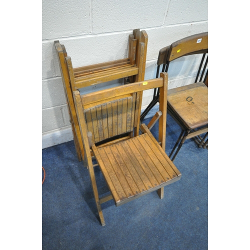 1311 - A VARIETY OF PERIOD CHAIRS, to include a set of four folding chairs, a set of three industrial stack... 