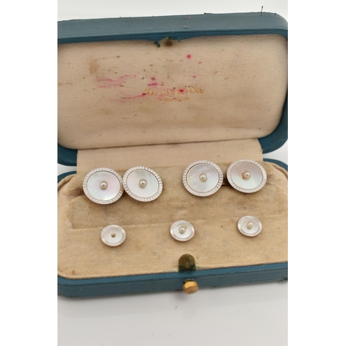 1 - A BOXED SET OF VINTAGE 'TIFFANY & CO' GENTS CUFFLINKS AND SHIRT STUDS, yellow and white metal round ... 