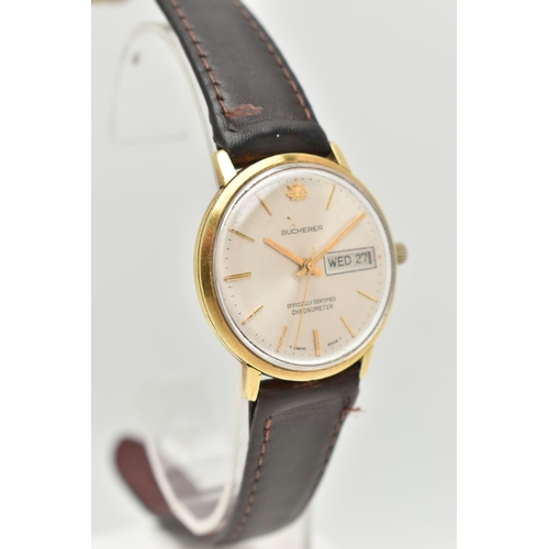 17 - A GENTLEMAN'S BUCHERER WRISTWATCH, the circular face with gold coloured baton markers and hands, day... 