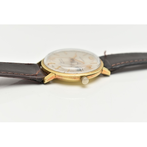 17 - A GENTLEMAN'S BUCHERER WRISTWATCH, the circular face with gold coloured baton markers and hands, day... 