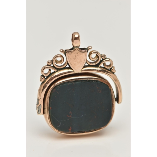 21 - A 9CT GOLD SWIVEL FOB, of a rounded rectangular form, set with a carnelian and bloodstone inlays, ru... 