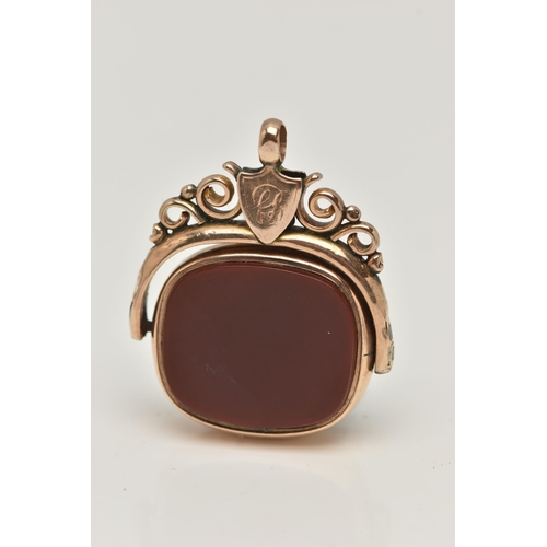 21 - A 9CT GOLD SWIVEL FOB, of a rounded rectangular form, set with a carnelian and bloodstone inlays, ru... 