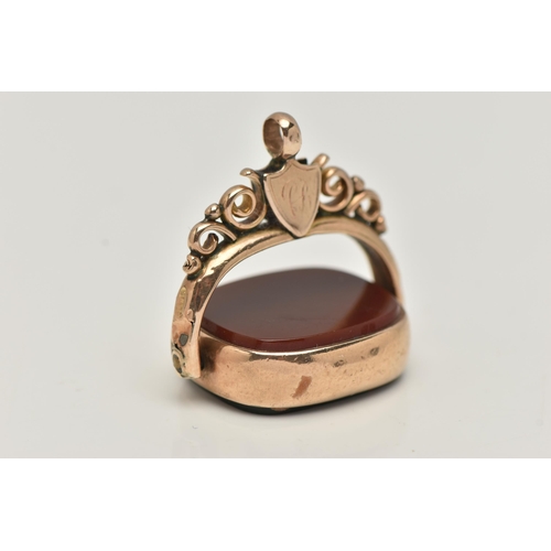 21 - A 9CT GOLD SWIVEL FOB, of a rounded rectangular form, set with a carnelian and bloodstone inlays, ru... 