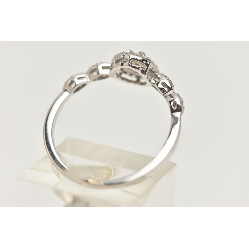 27 - A 9CT WHITE GOLD DIAMOND RING, centering on a round brilliant cut diamond, estimated diamond weight ... 