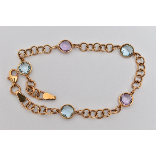 38 - A 9CT GOLD GEM SET LINE BRACELET, designed as a circular link bracelet set with two circular cut ame... 