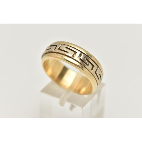 47 - A BI COLOUR GREEK RING, a yellow metal ring, fitted with a central spinning Greek key pattern, appro... 