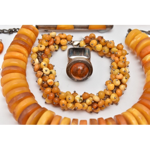 71 - AN ASSORTMENT OF AMBER JEWELLERY, to include a large statement necklace, comprised of thirty nine am... 