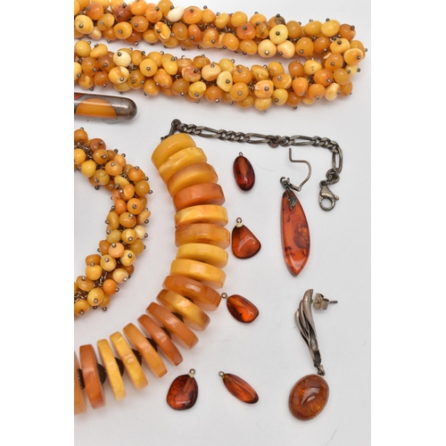 71 - AN ASSORTMENT OF AMBER JEWELLERY, to include a large statement necklace, comprised of thirty nine am... 