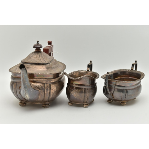 102 - A MID 20TH CENTURY SILVER TEA SET, three piece set comprising of a teapot, double handled sugar bowl... 