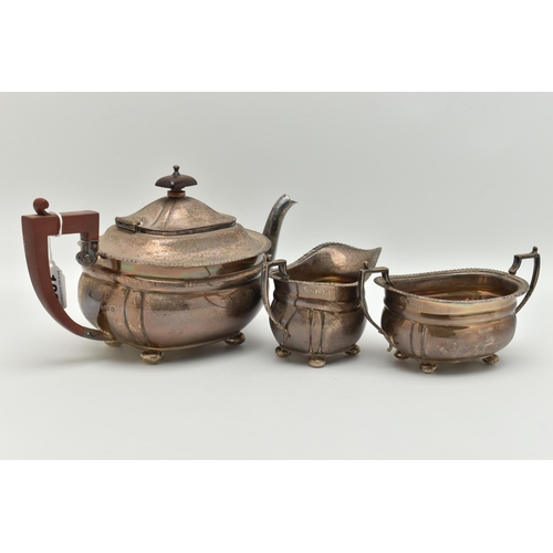 102 - A MID 20TH CENTURY SILVER TEA SET, three piece set comprising of a teapot, double handled sugar bowl... 