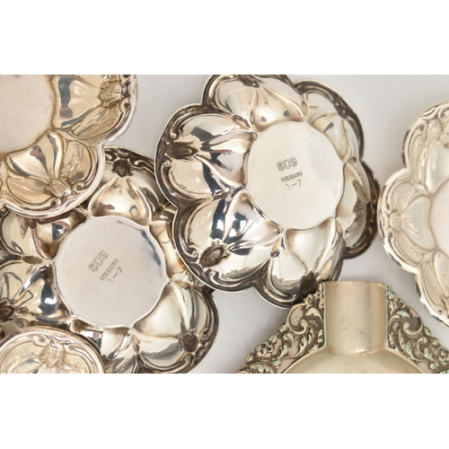 112 - ASSORTED WHITE METAL ITEMS, to include a continental white metal oval ashtray with embossed street s... 