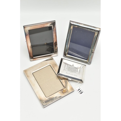 113 - A WHITE METAL CIGARETTE CASE AND PHOTO FRAMES, the cigarette case engraved depicting the Taj Mahal I... 