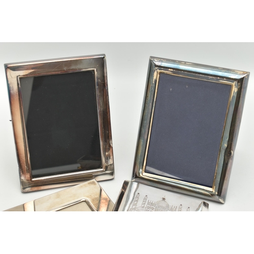 113 - A WHITE METAL CIGARETTE CASE AND PHOTO FRAMES, the cigarette case engraved depicting the Taj Mahal I... 