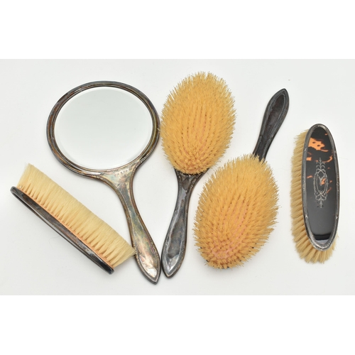 116 - A BOXED SILVER AND FAUX TORTOISESHELL DRESSING TABLE SET, comprising of two hair brushes, two clothe... 