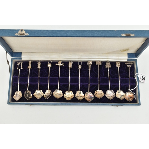 124 - A CASED SET OF CONTINETAL WHITE METAL TEASPOONS, a set of twelve teaspoons, with flower shape bowls,... 