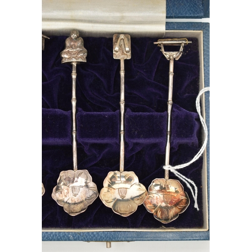 124 - A CASED SET OF CONTINETAL WHITE METAL TEASPOONS, a set of twelve teaspoons, with flower shape bowls,... 