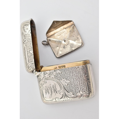 86 - AN EARLY 20TH CENTURY SILVER VESTA AND STAMP CASE, the rectangular vesta with engraved scrolling aca... 