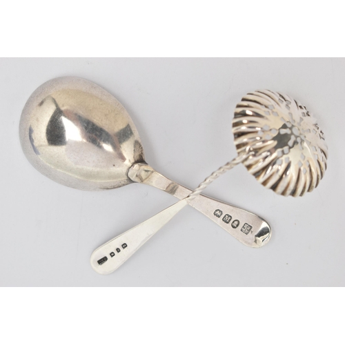 88 - TWO SILVER SPOONS, the first a George III silver caddy spoon with engraved M initial to the terminal... 