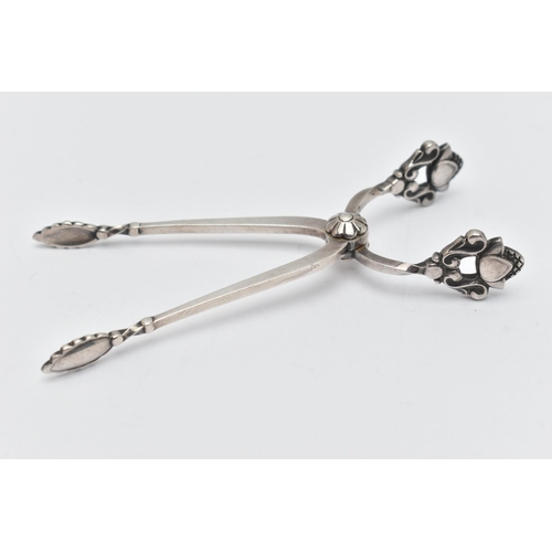 89 - A PAIR OF GEORG JENSEN SILVER SUGAR TONGS, with stylised acorn handles, maker's marks, import mark f... 