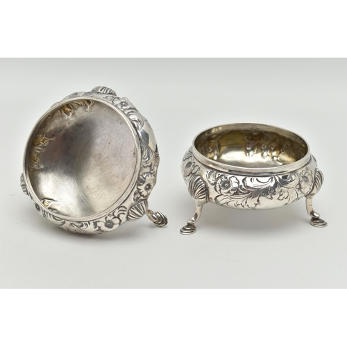 92 - A PAIR OF EARLY VICTORIAN SILVER SALTS, of circular outline with embossed floral and foliate decorat... 