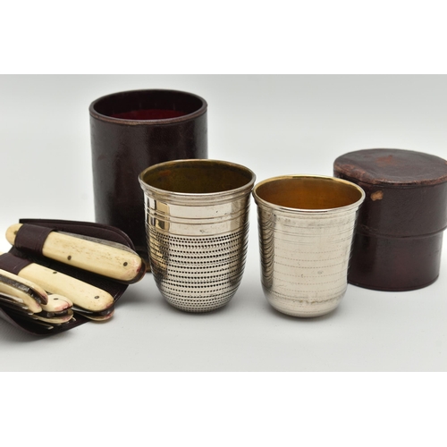 93 - A SELECTION OF ITEMS, to include two non-matching campaign drinking cups in a leather tubular case, ... 