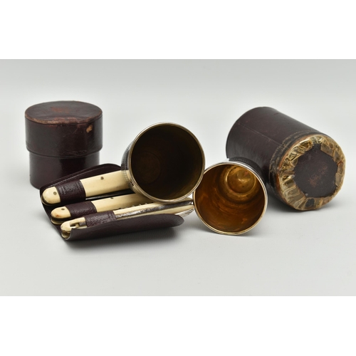 93 - A SELECTION OF ITEMS, to include two non-matching campaign drinking cups in a leather tubular case, ... 