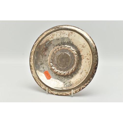 97 - A PERUVIAN WHITE METAL DISH MOUNTED WITH A SPANISH COIN, round dish, stamped to the reverse 'Kohler ... 