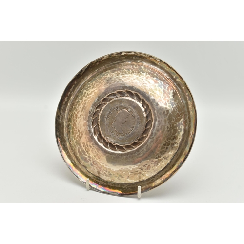 97 - A PERUVIAN WHITE METAL DISH MOUNTED WITH A SPANISH COIN, round dish, stamped to the reverse 'Kohler ... 