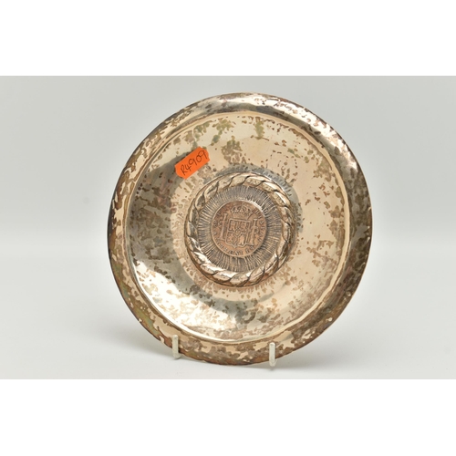 98 - A PERUVIAN WHITE METAL DISH MOUNTED WITH A SPANISH COIN, round dish, stamped to the reverse 'Kohler ... 