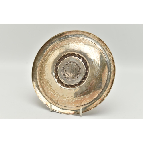 98 - A PERUVIAN WHITE METAL DISH MOUNTED WITH A SPANISH COIN, round dish, stamped to the reverse 'Kohler ... 