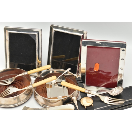 130 - A SELECTION OF SILVER ITEMS, to include two silver and wooden based bottle coasters, each hallmarked... 