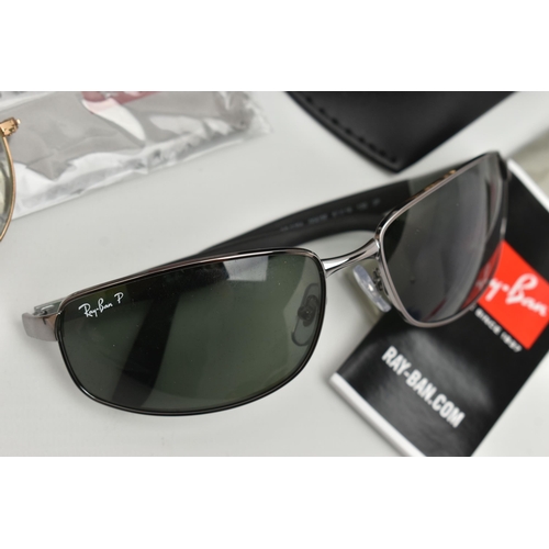 131 - TWO PAIRS OF POLARIZED 'RAY BAN' SUNGLASSES AND A PAIR OF 'RAY BAN' GLASSES, a pair of tortoise fram... 