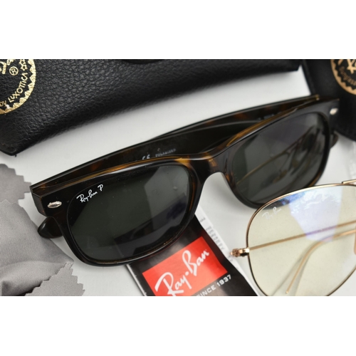 131 - TWO PAIRS OF POLARIZED 'RAY BAN' SUNGLASSES AND A PAIR OF 'RAY BAN' GLASSES, a pair of tortoise fram... 