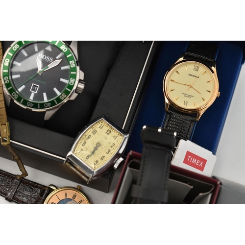 134 - A SELECTION OF WRISTWATCHES, to include a gents 'Hugo Boss, Hole In One Club' quartz wristwatch, lar... 