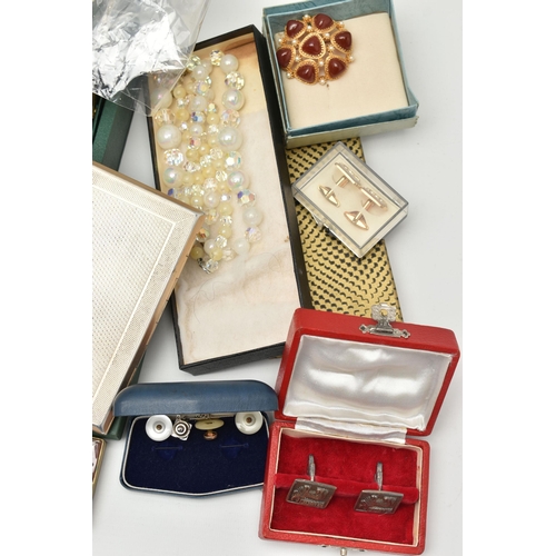 142 - A BOX OF ASSORTED ITEMS, to include various sets of cufflinks and dress studs, running medallion, a ... 