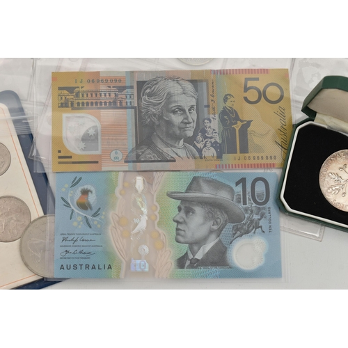 158 - A SMALL CARDBOARD BOX CONTAINING AUSTALIA BANKNOTES WITH MIXED COINAGE, to include a Royal Mint case... 