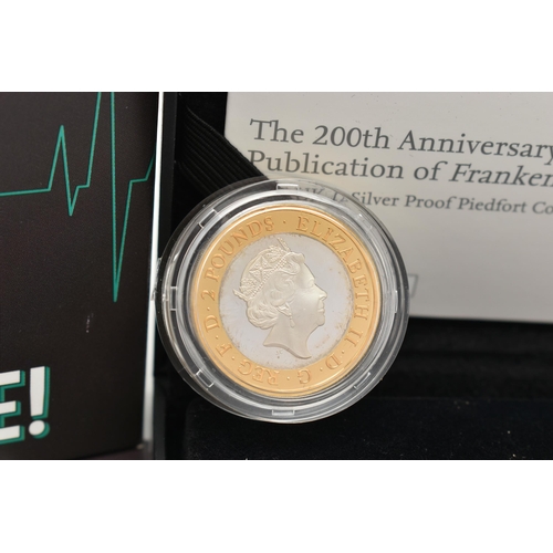 164 - A PARCEL CONTAINING A ROYAL MINT (Mary Shelley's) FRANKENSTEIN PIEDFORT SILVER PROOF £2 COIN, bookle... 