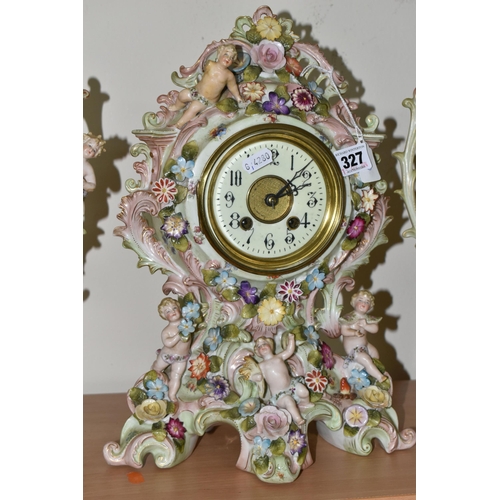 327 - A GERMAN PORCELAIN CLOCK GARNITURE SET,  porcelain clock garniture, late 19th century, the cartouche... 