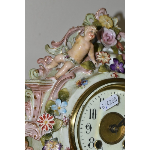 327 - A GERMAN PORCELAIN CLOCK GARNITURE SET,  porcelain clock garniture, late 19th century, the cartouche... 