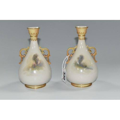 330 - TWO ROYAL WORCESTER TWIN HANDLED BALUSTER VASES, HAND PAINTED WITH PHEASANTS BY JAMES STINTON, signe... 