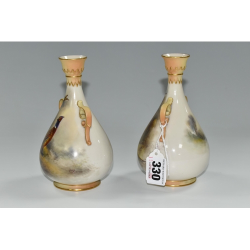 330 - TWO ROYAL WORCESTER TWIN HANDLED BALUSTER VASES, HAND PAINTED WITH PHEASANTS BY JAMES STINTON, signe... 