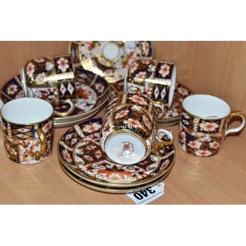 340 - SIX ROYAL CROWN DERBY IMARI 2451 PATTERN COFFEE CUPS AND SAUCERS, comprising three coffee cups and t... 