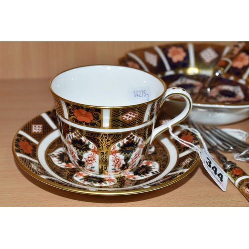 344 - A GROUP OF ROYAL CROWN DERBY IMARI 1128 PATTERN TEAWARE, comprising a wavy rim dish, date cypher 191... 