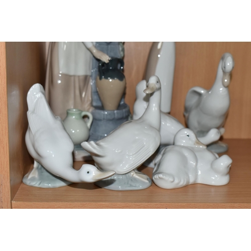 357 - A GROUP OF SEVEN NAO BY LLADRO FIGURES, comprising 'Girl Holding a Duck', 'Girl at the Water Fountai... 