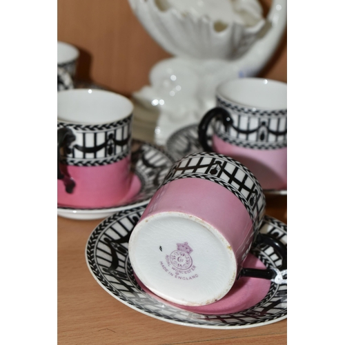 373 - A SET OF SIX EDWARDIAN ROYAL WORCESTER 907 COFFEE CANS AND SAUCERS, featuring a black and white 'Rai... 