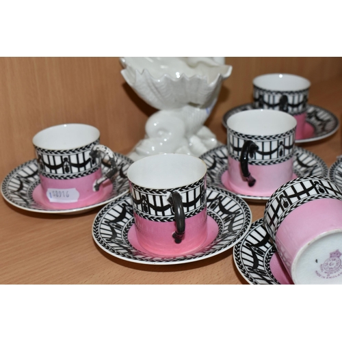 373 - A SET OF SIX EDWARDIAN ROYAL WORCESTER 907 COFFEE CANS AND SAUCERS, featuring a black and white 'Rai... 