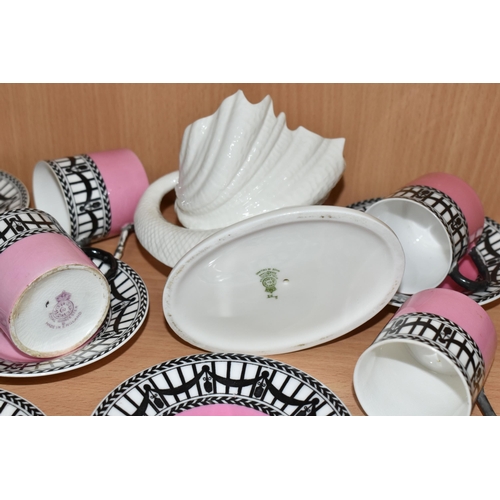 373 - A SET OF SIX EDWARDIAN ROYAL WORCESTER 907 COFFEE CANS AND SAUCERS, featuring a black and white 'Rai... 